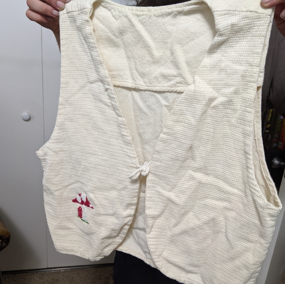 Unlabeled Beige or Tan vest. Probably Linen